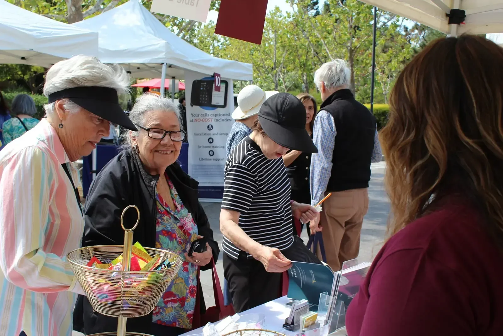 Group Walking at Event Booth