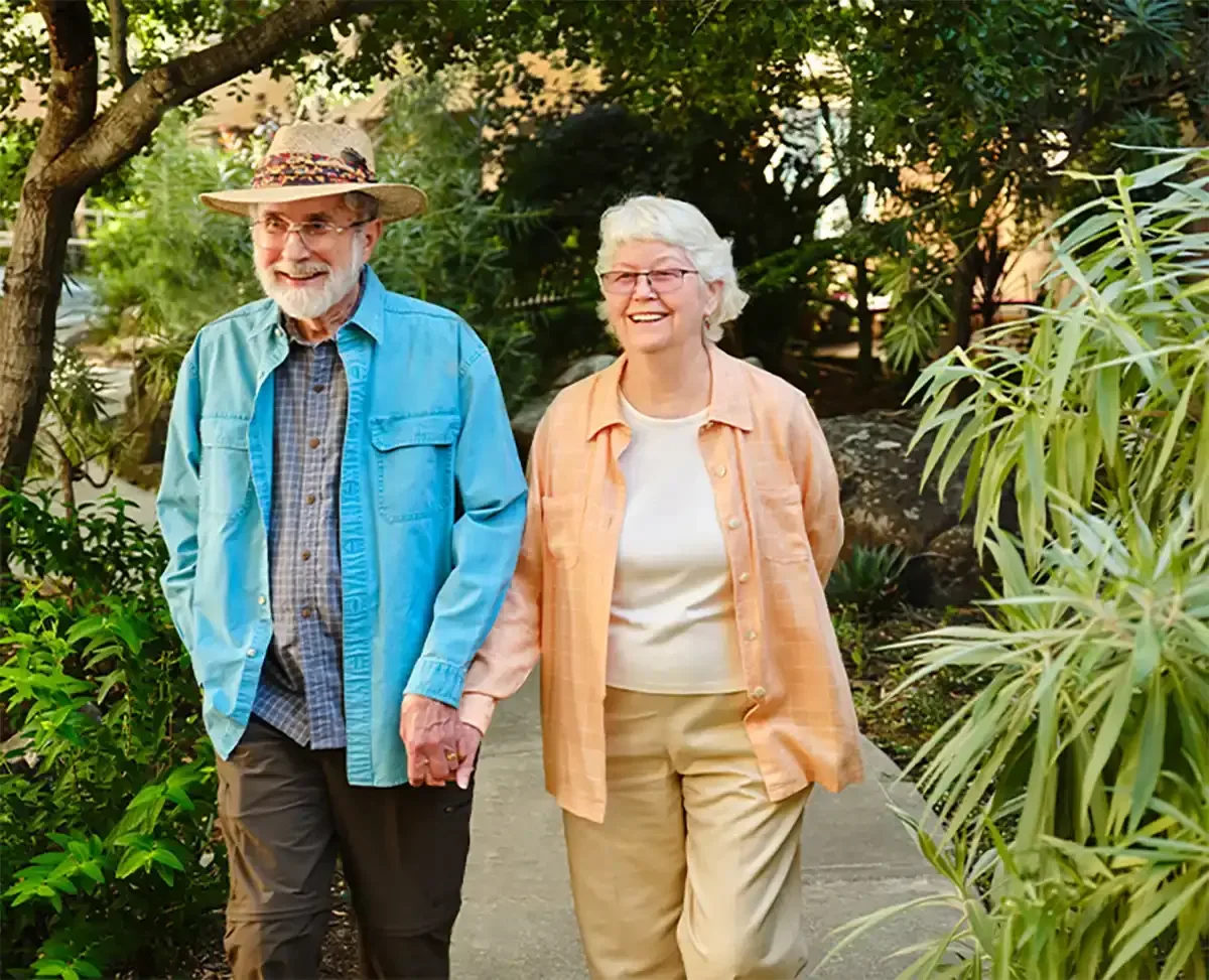 Residents walking through garden